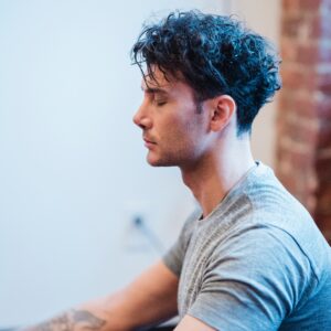 Man practicing yoga for strength and balance — yoga for athletes in Altea